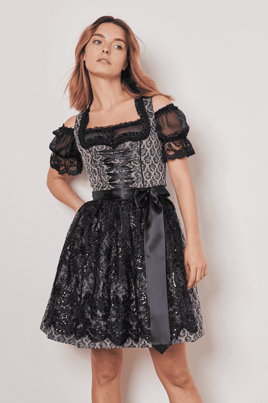 Das taillierte Dirndl Lonie mit Herz-Ausschnitt und ärmellosem Design schmeichelt deiner Figur