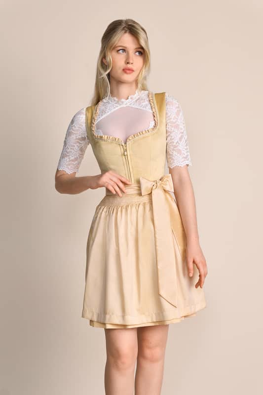 Elegantes Dirndl Annina aus unserer zauberhaften MADL-Kollektion. Das unifarbene Mieder aus Velour