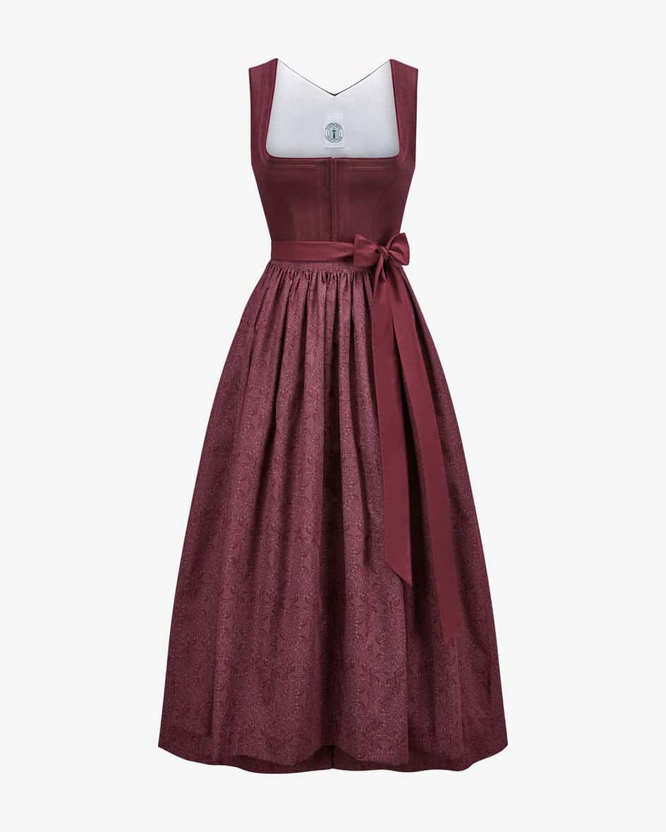 Lyana Dirndl lang mit Schürze für Damen von Tostmann in Aubergine. Trachten-Handwerk aus Österreich - Das traditionelle Modell überzeugt mit.... Mehr Details bei Lodenfrey.com!