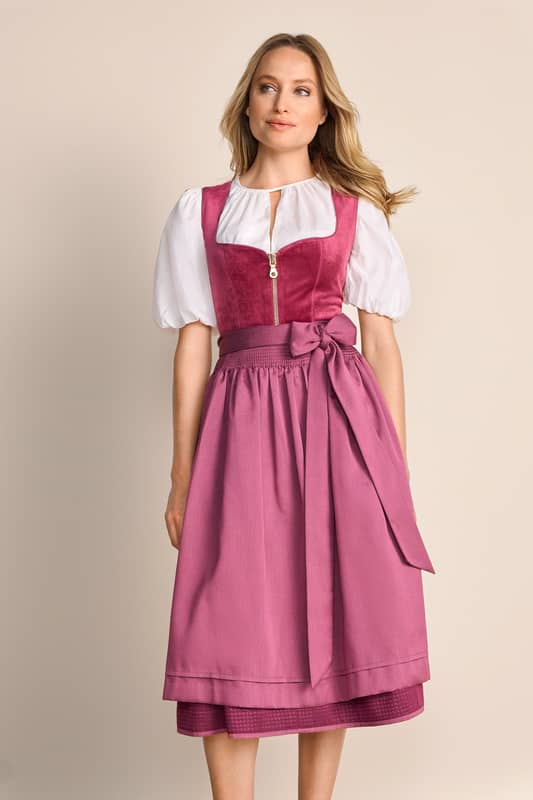 Das Limited Edition Dirndl Ayuna besticht durch sein unifarbenes Muster und ein zartes Muster am Rock